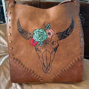 Rustic Brown Shoulder Bag with Floral Skull Design